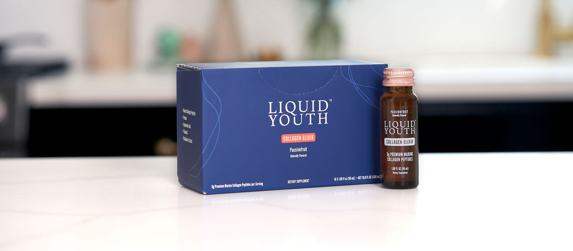 Liquid Youth Premium Collagen Product: Collagen Elixir box and bottle on a kitchen counter